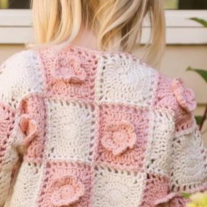 Granny Square Cardigan Pattern Free inspiration with raised pink crochet flowers.